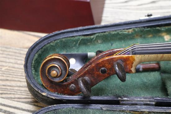 A 19th century violin, two piece back, cased with a later bow